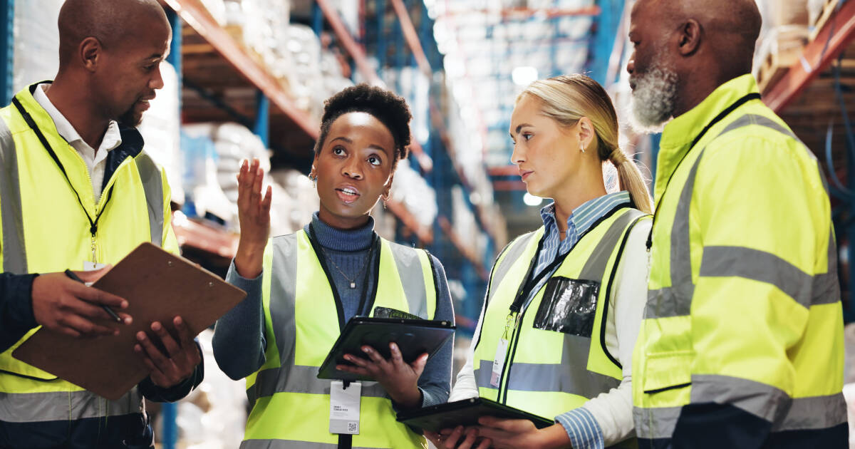 Warehouse,,Supply,Chain,And,People,With,Tablet,In,Meeting,For